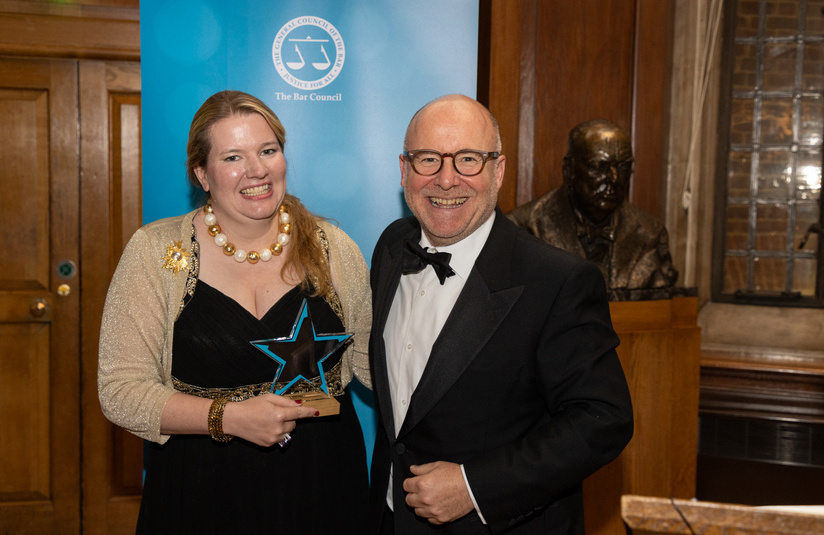 A photo of Lucinda Orr with her award