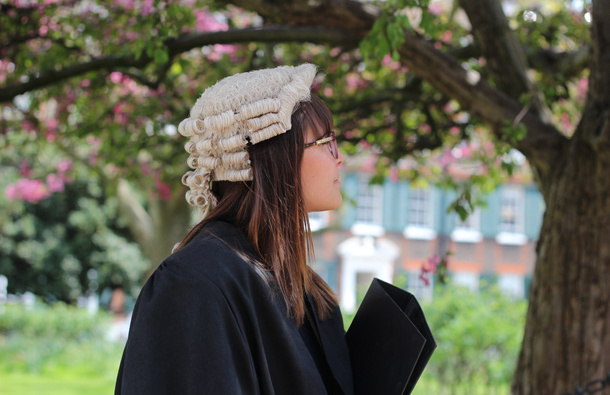 Pupil barrister under a tree.